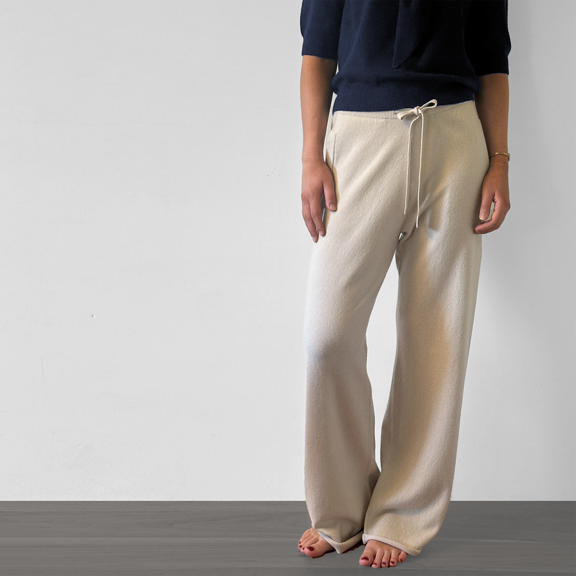 MA44 Cashmere Trousers with pockets by Mawei, off white, front view, female model.
