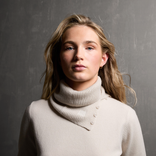 MA61 Cashmere Buff with Buttons by Mawei, off white, front view, female model.