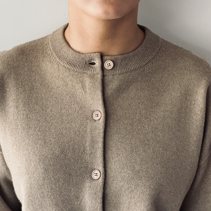 MA06 Cashmere Crewneck Cardigan by Mawei, beige camel, close up, front view, female model.