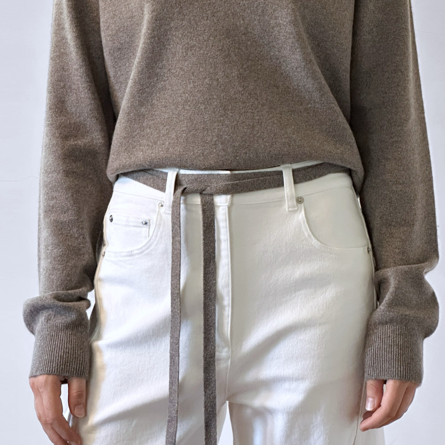 MA91 Cashmere Ribbon by Mawei, grey brown, belt, female model.