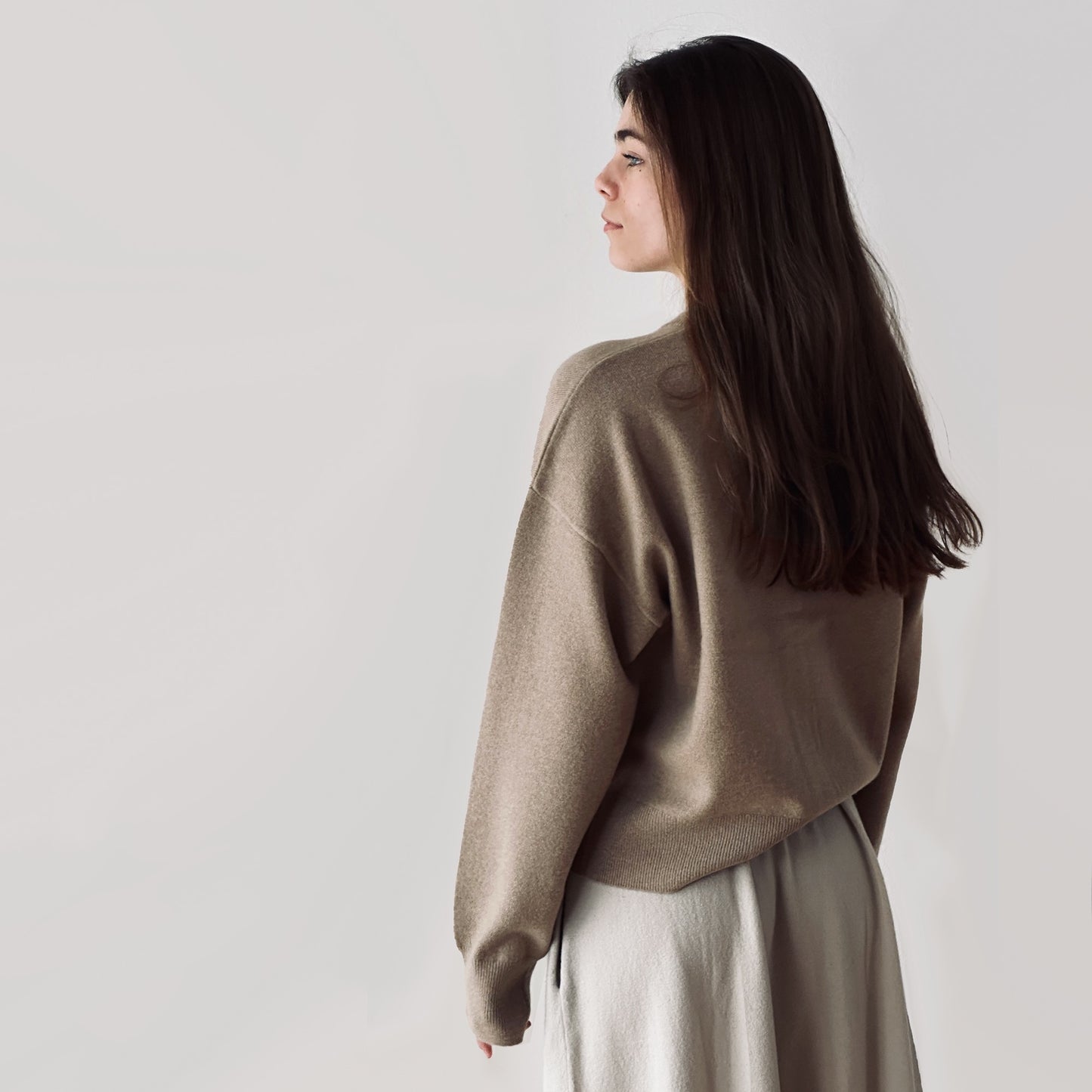 MA06 Cashmere Crewneck Cardigan by Mawei, beige camel, back view, female model.