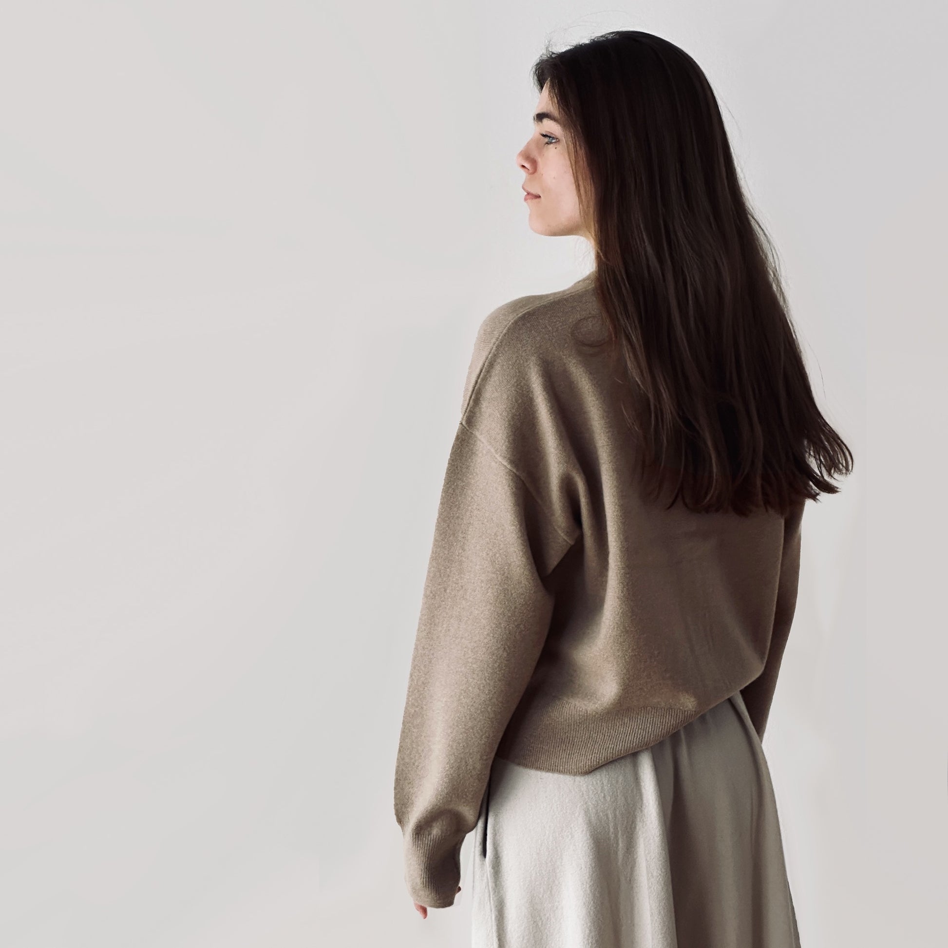 MA06 Cashmere Crewneck Cardigan by Mawei, beige camel, back view, female model.