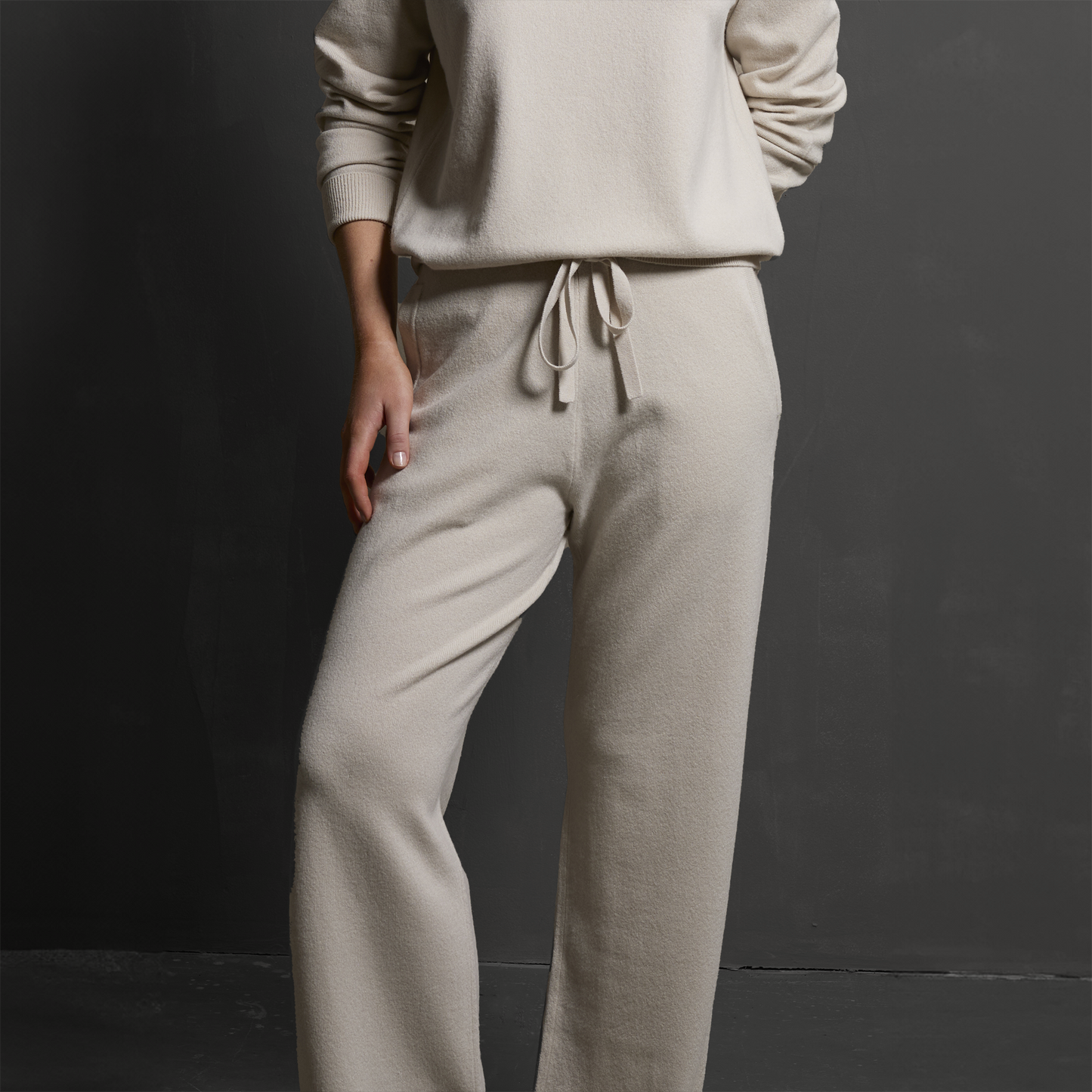 MA44 Cashmere Trousers with pockets by Mawei, off white, front view, female model.