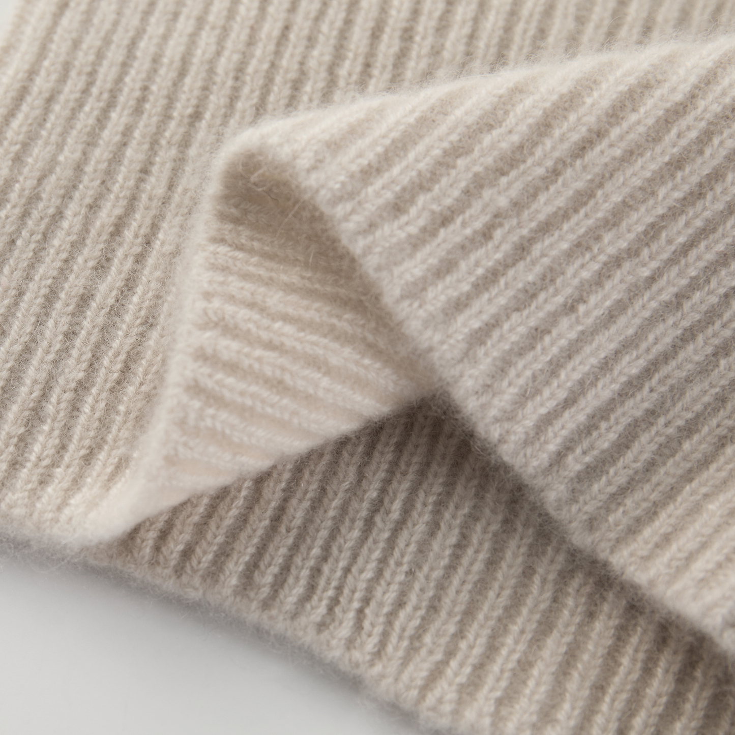 MA61 Cashmere Buff with Buttons by Mawei, off-white, fabric texture close-up.