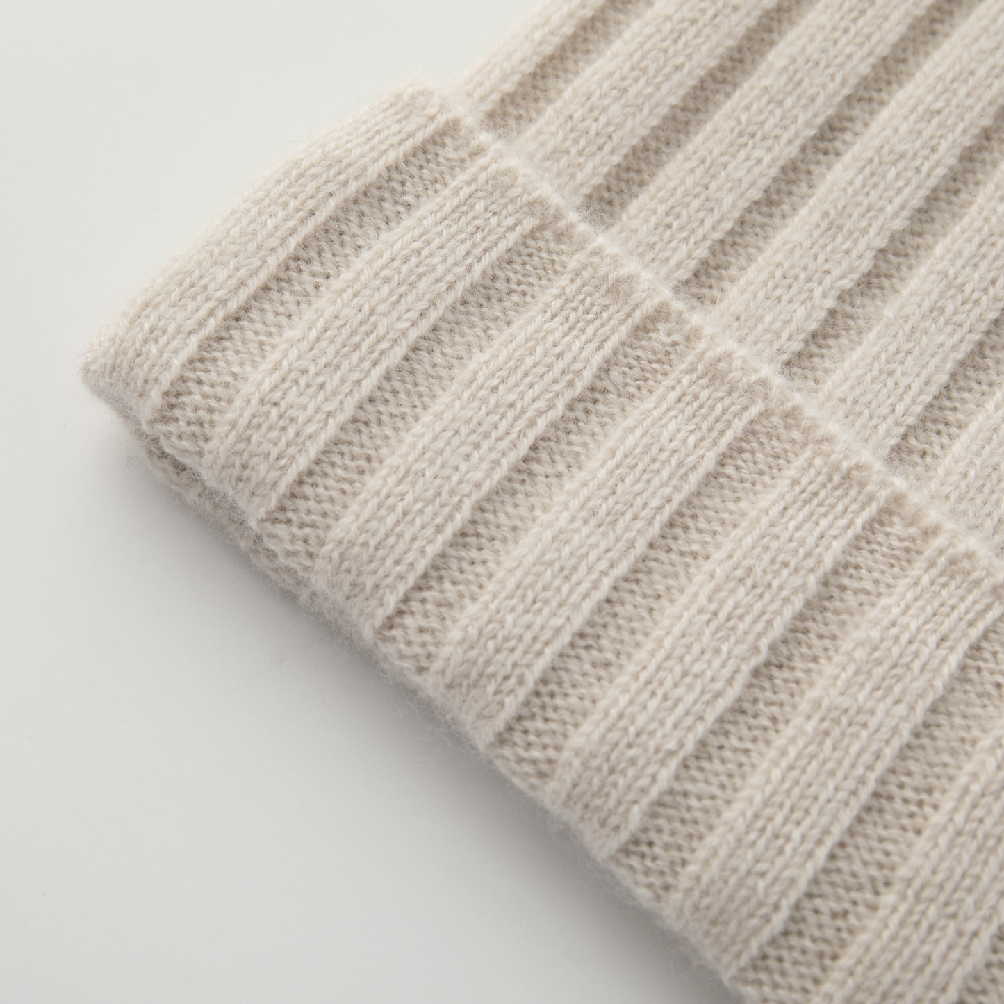 MA71 Cashmere Beanie by Mawei, off white, rib details, close-up, flat lay.