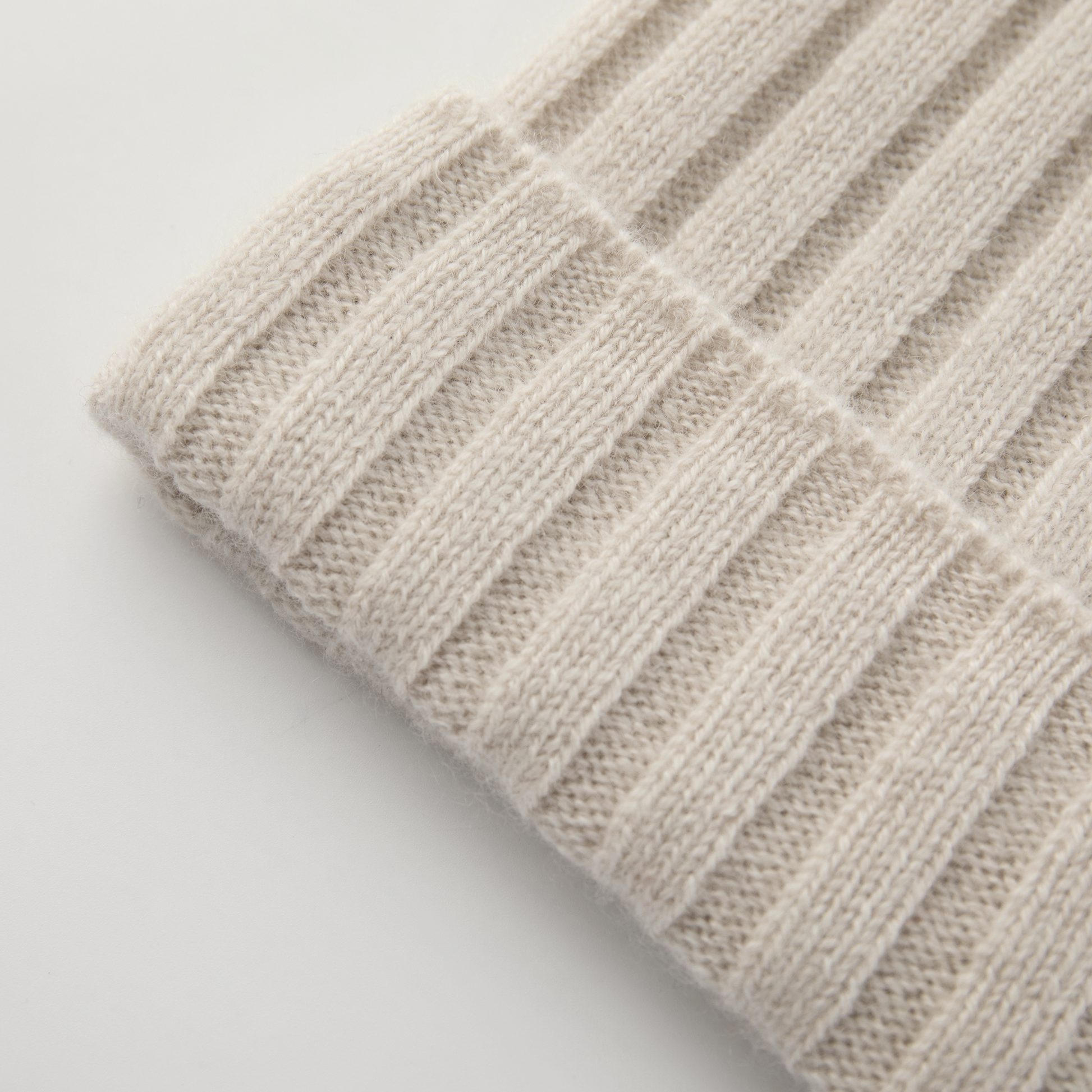 MA71 Cashmere Beanie by Mawei, off white, rib details, close-up, flat lay.