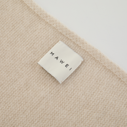 MA81 Cashmere Triangular Scarf by Mawei, off white, edge detail close-up.