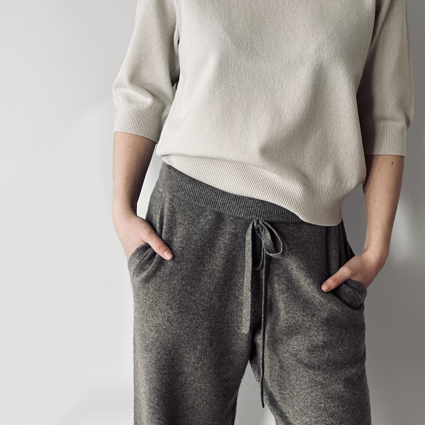 MA44 Cashmere Trousers with pockets by Mawei, grey, front view, female model.