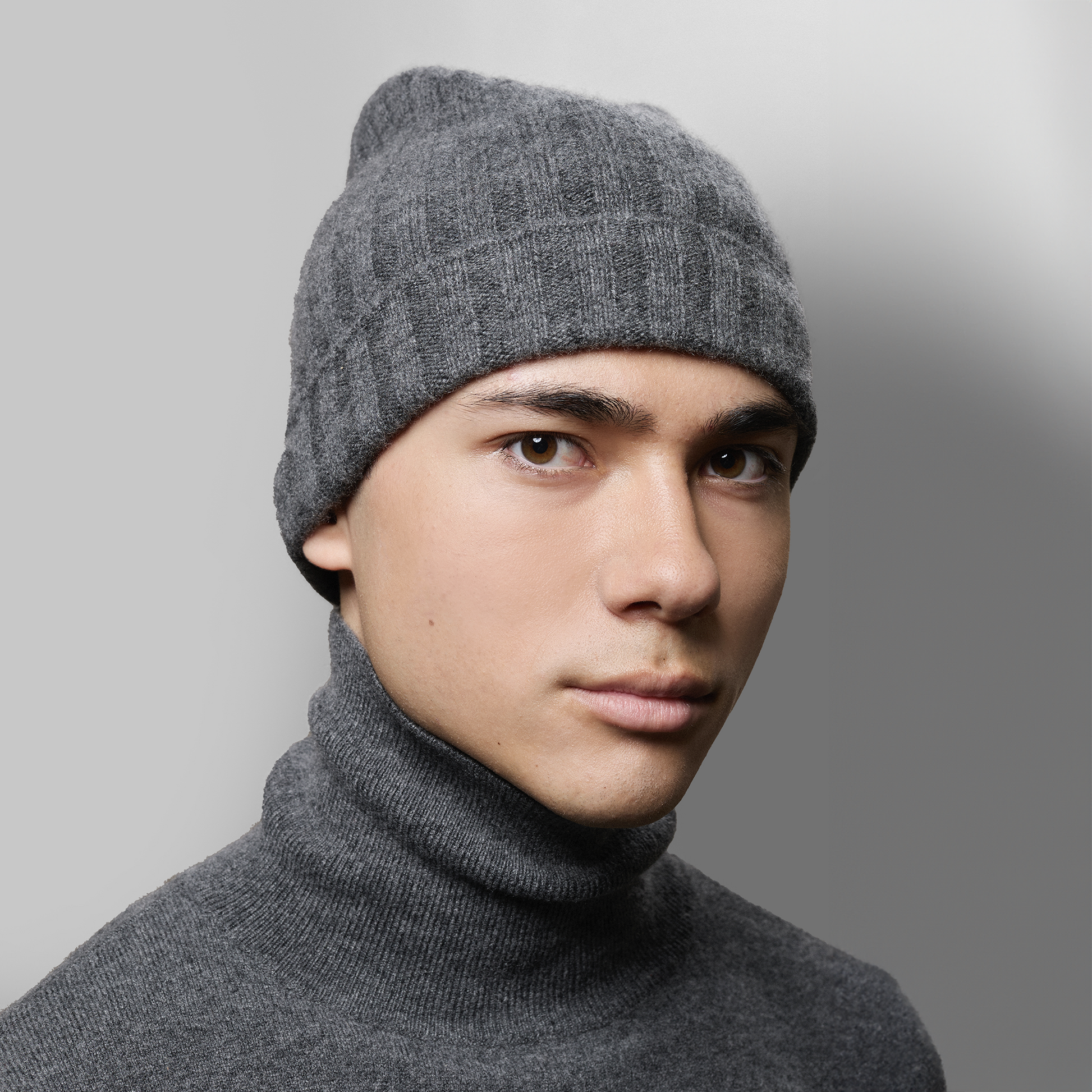 MA71 Cashmere Beanie by Mawei, grey-brown, front view, male model.