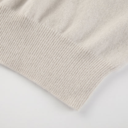 MA03 Cashmere Short Sleeve Crewneck Sweater by Mawei, off white, hem rib detail close-up.