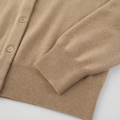 MA06 Cashmere Crewneck Cardigan by Mawei, beige camel, hem, cuff rib detail close-up.