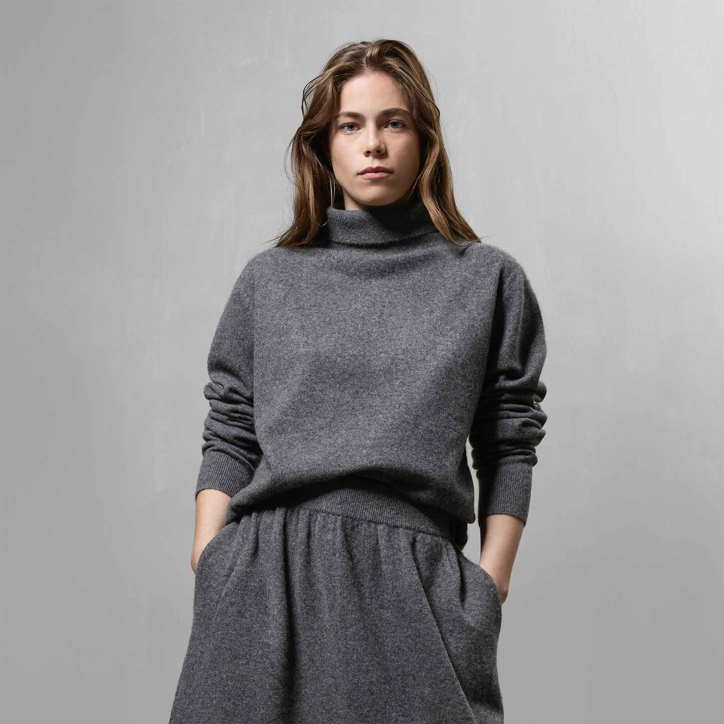 MA21 Cashmere Turtleneck Sweater by Mawei, grey, front view, female model.