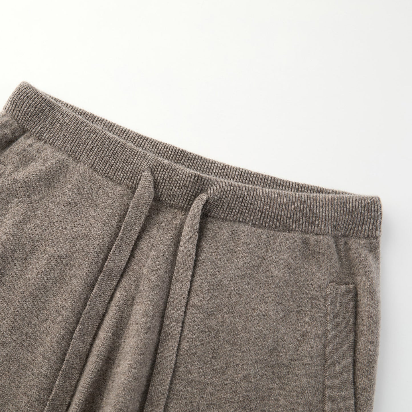 MA44 Cashmere Trousers with pockets by Mawei, grey brown, waist rib and string details close-up