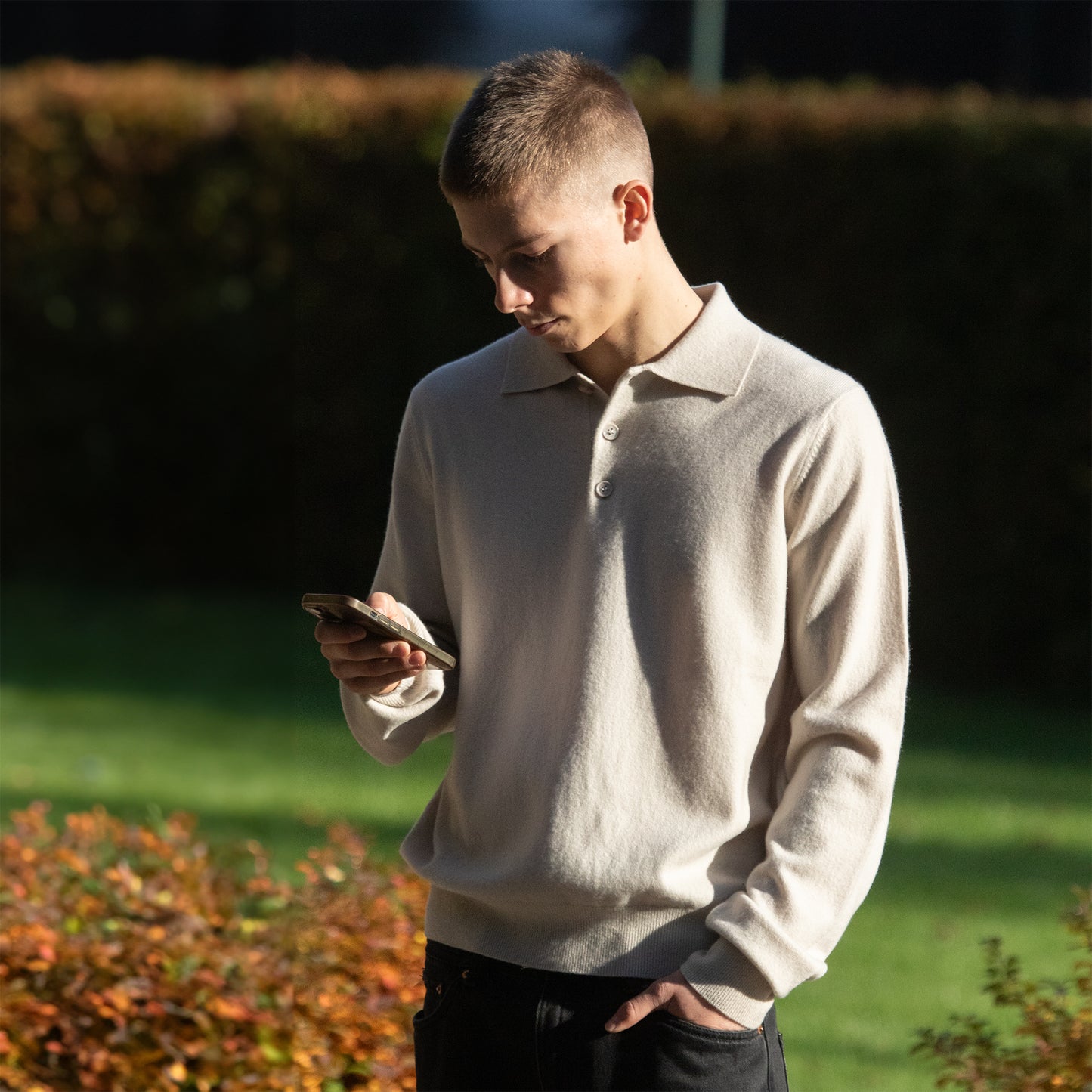MA25 Cashmere Polo Sweater by Mawei, off white, front view, male model.
