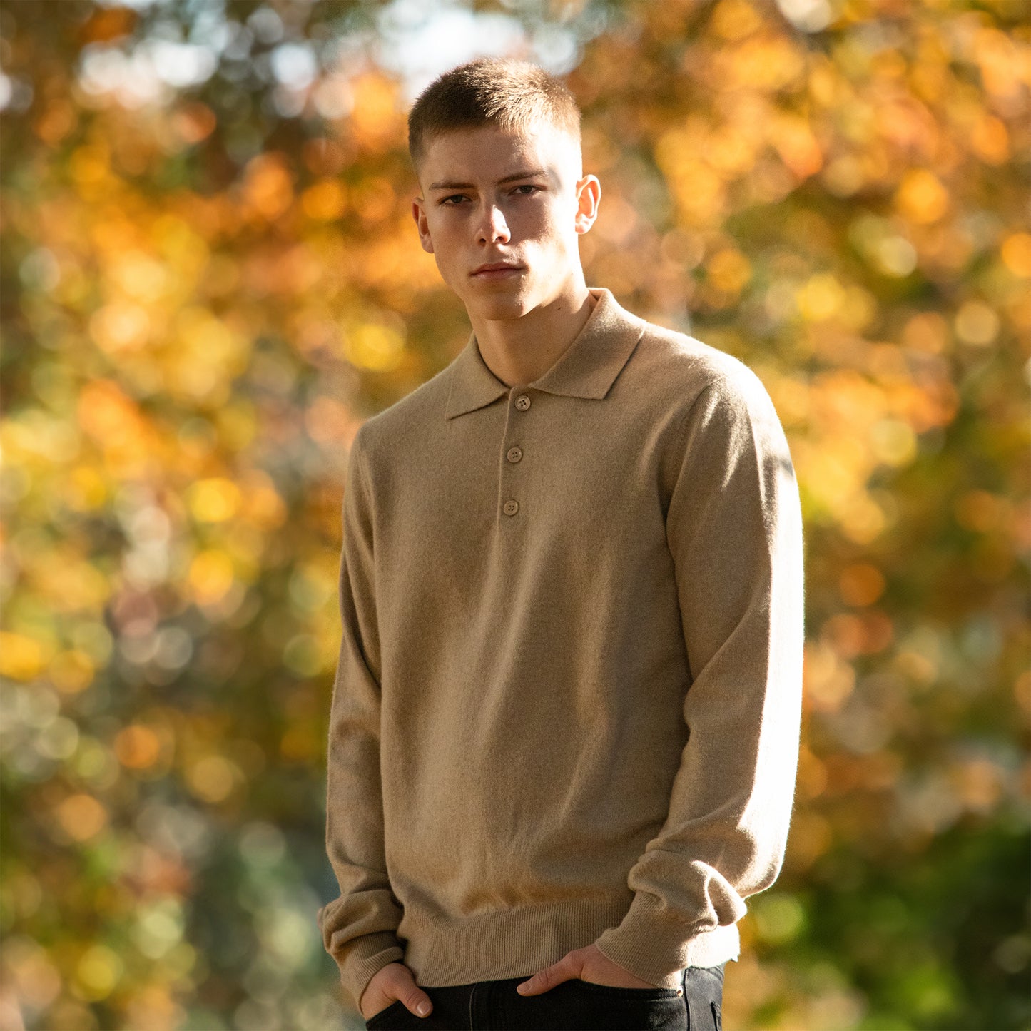 MA25 Cashmere Polo Sweater by Mawei, beige camel, front view, male model.