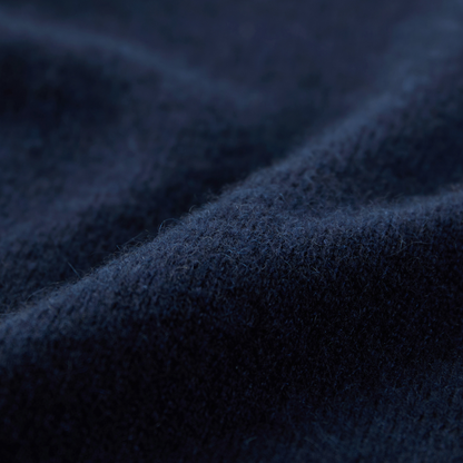 MA25 Cashmere Polo Sweater by Mawei, navy blue, fabric texture close-up.