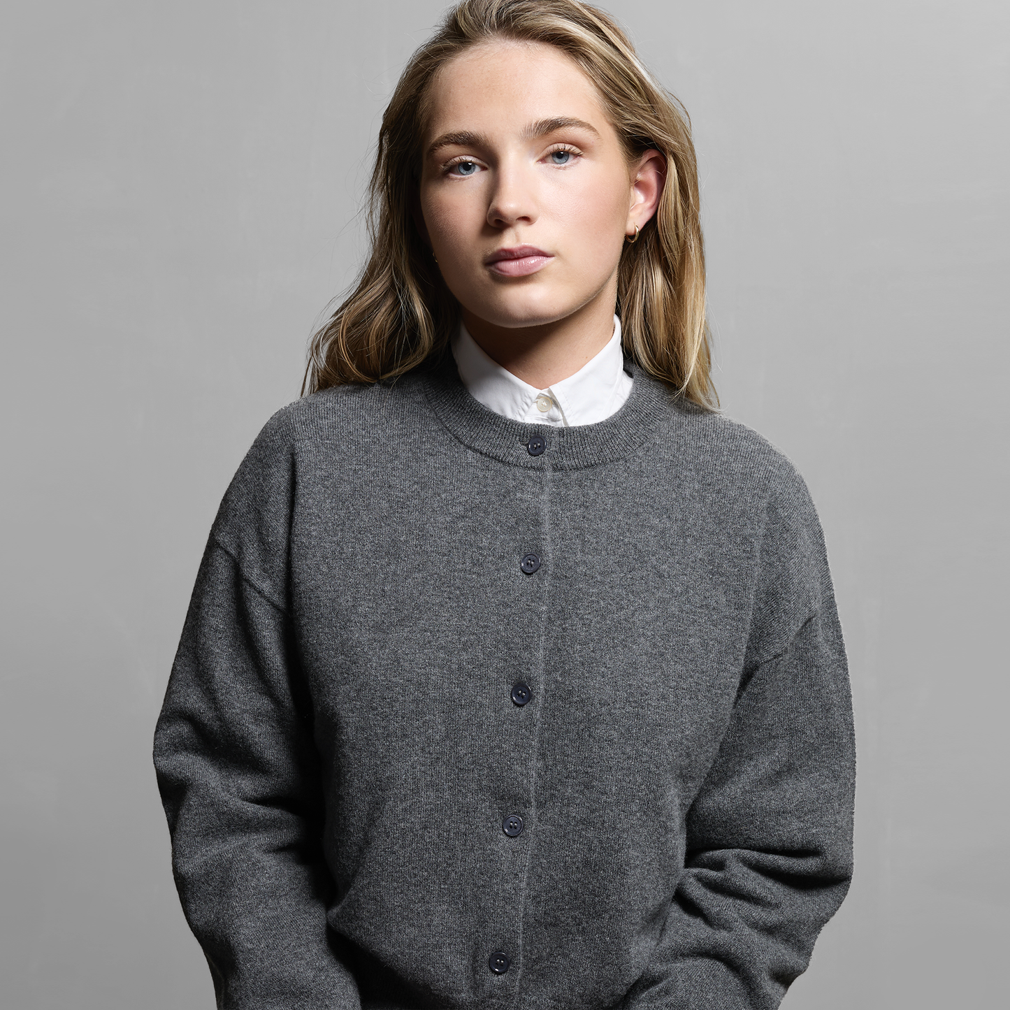 MA06 Cashmere Crewneck Cardigan by Mawei, grey, front view, female model.