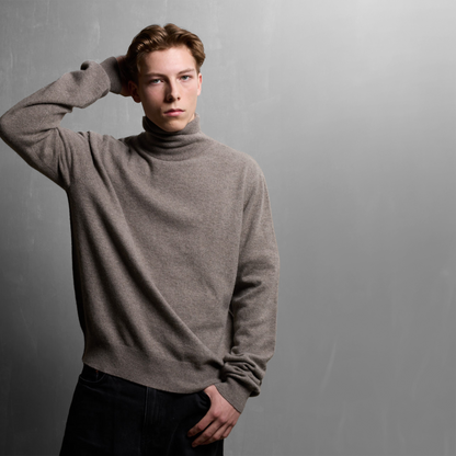 MA21 Cashmere Turtleneck Sweater by Mawei, grey-brown, front view, male model.