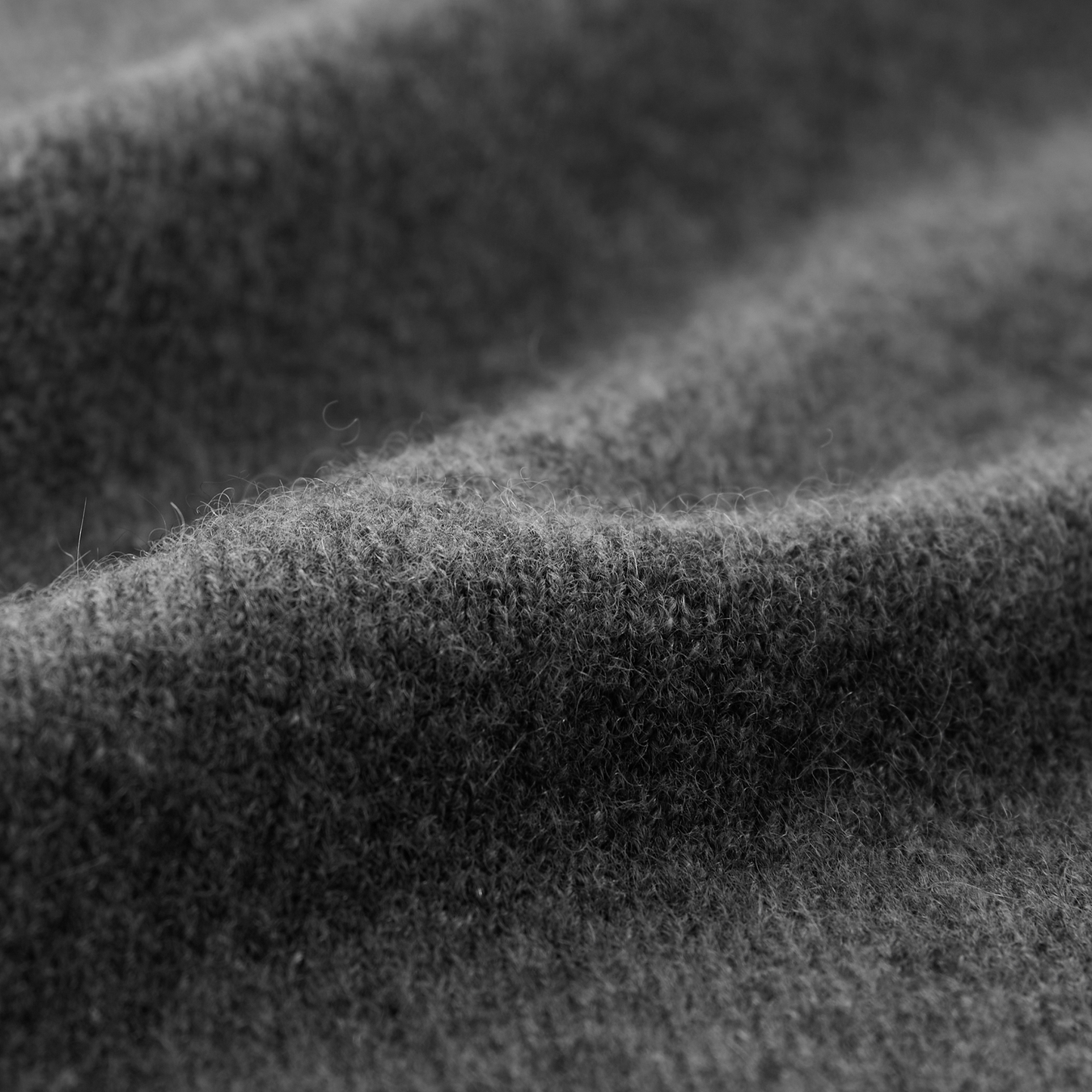 MA44 Cashmere Trousers with pockets by Mawei, grey, fabric texture close-up.