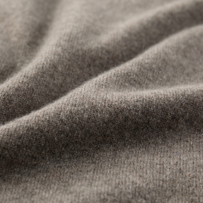 MA21 Turtleneck Cashmere Sweater by Mawei, grey-brown, fabric texture close-up.