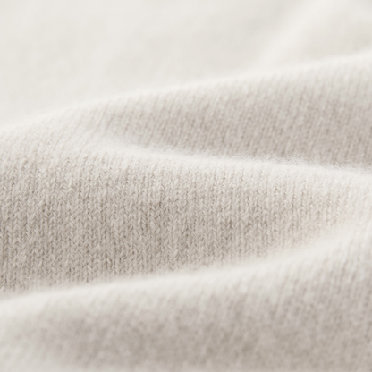 MA25 Cashmere Polo Sweater by Mawei, off-white, fabric texture close-up.
