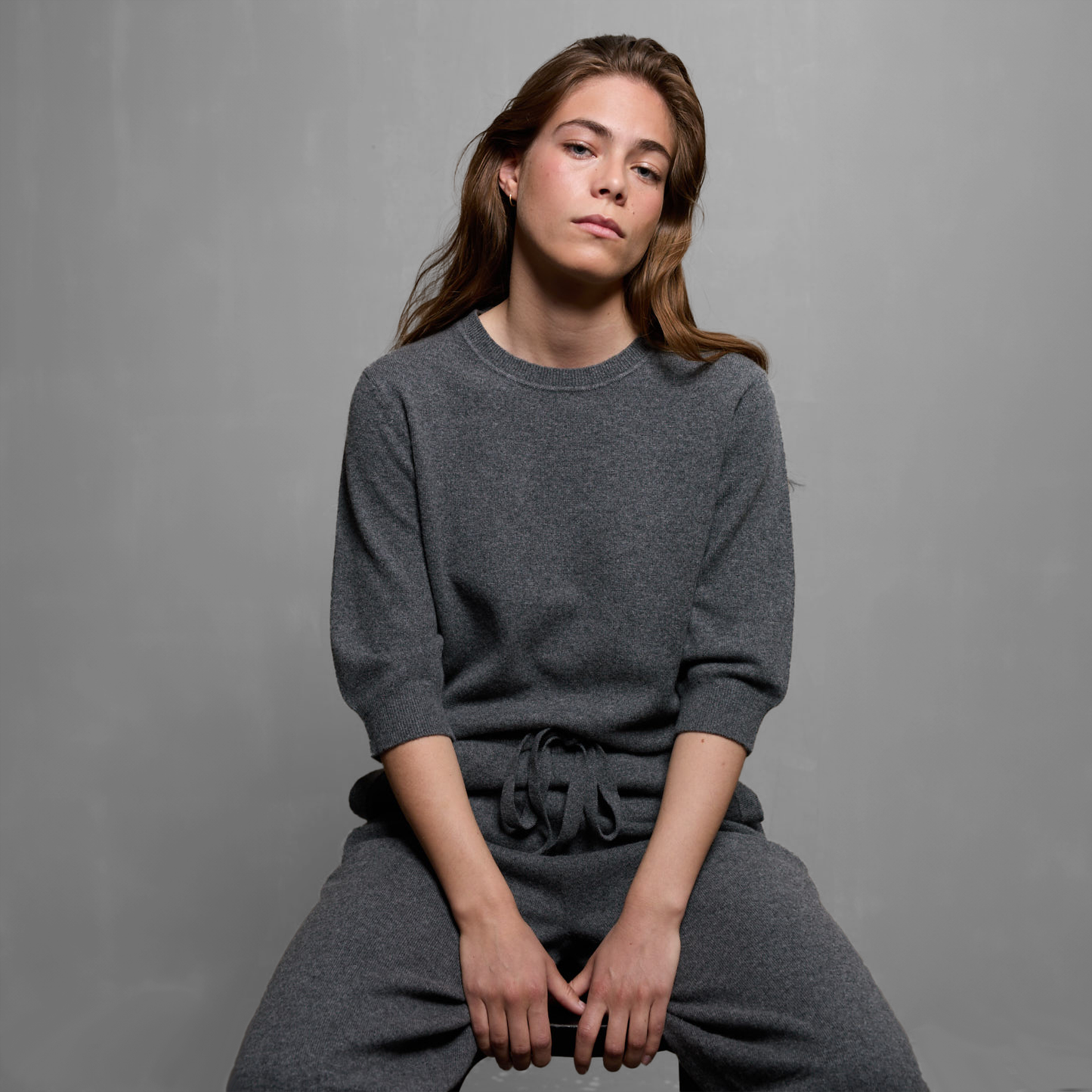 MA03 Cashmere Short Sleeve Crewneck Sweater by Mawei, grey, front view, female model.