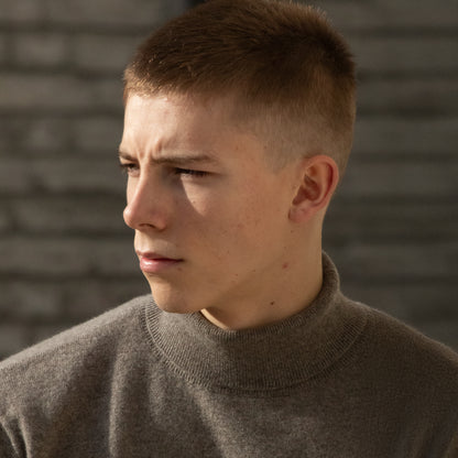 MA21 Cashmere Turtleneck Sweater by Mawei, grey-brown, front view, close-up, male model.