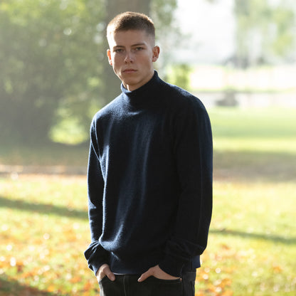 MA21 Cashmere Turtleneck Sweater by Mawei, navy blue, front view, male model.