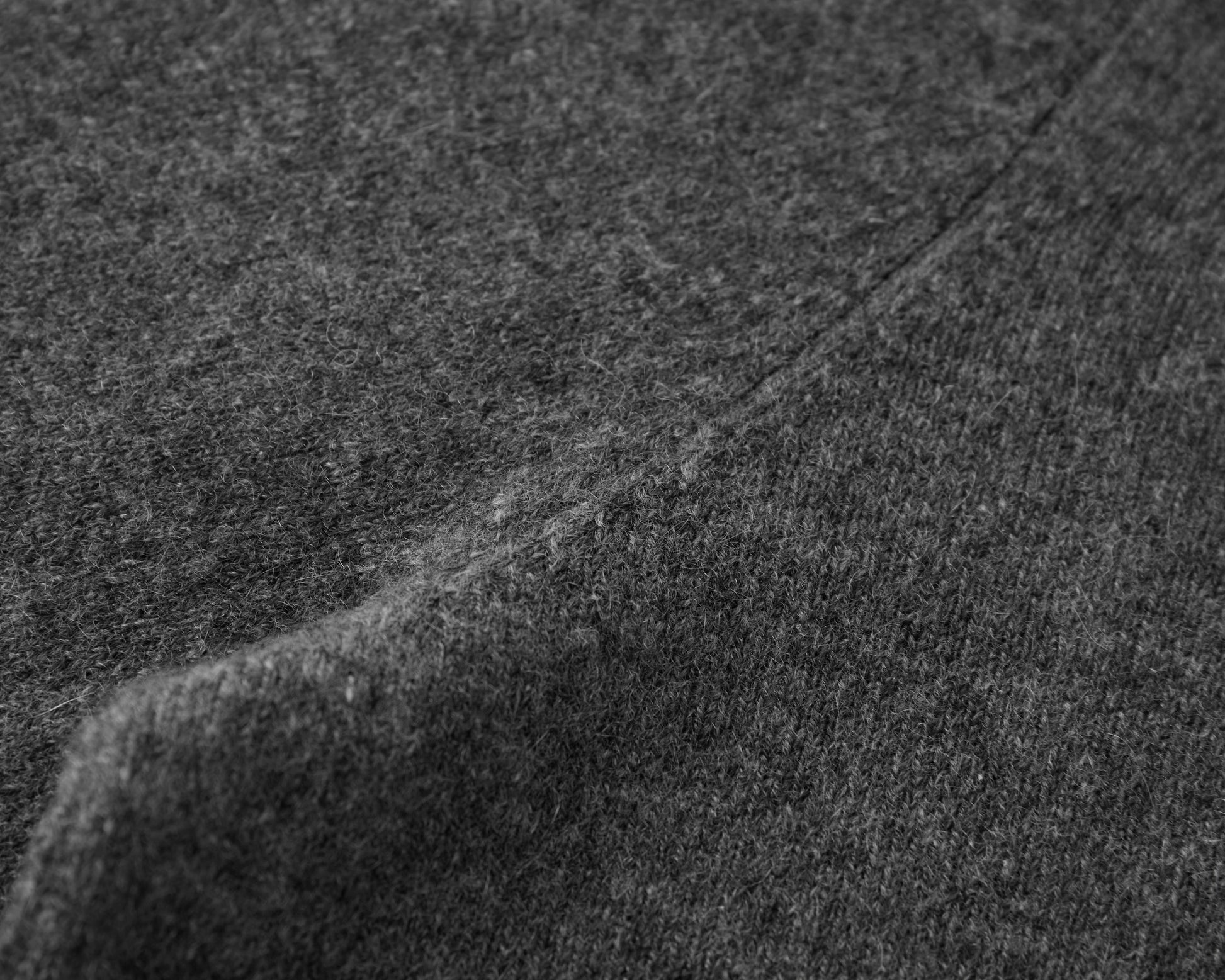 MA22 Cashmere Crewneck Sweater by Mawei, grey, fabric and knitting details  close-up.