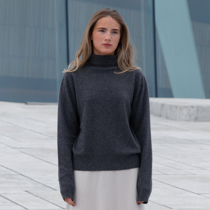 MA21 Cashmere Turtleneck Sweater by Mawei, grey, front view, female model.