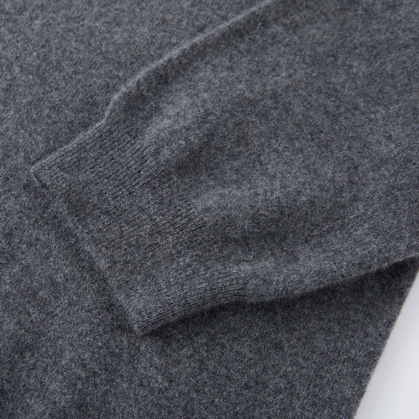 MA03 Cashmere Short Sleeve Crewneck Sweater by Mawei, grey, cuff rib detail close-up.