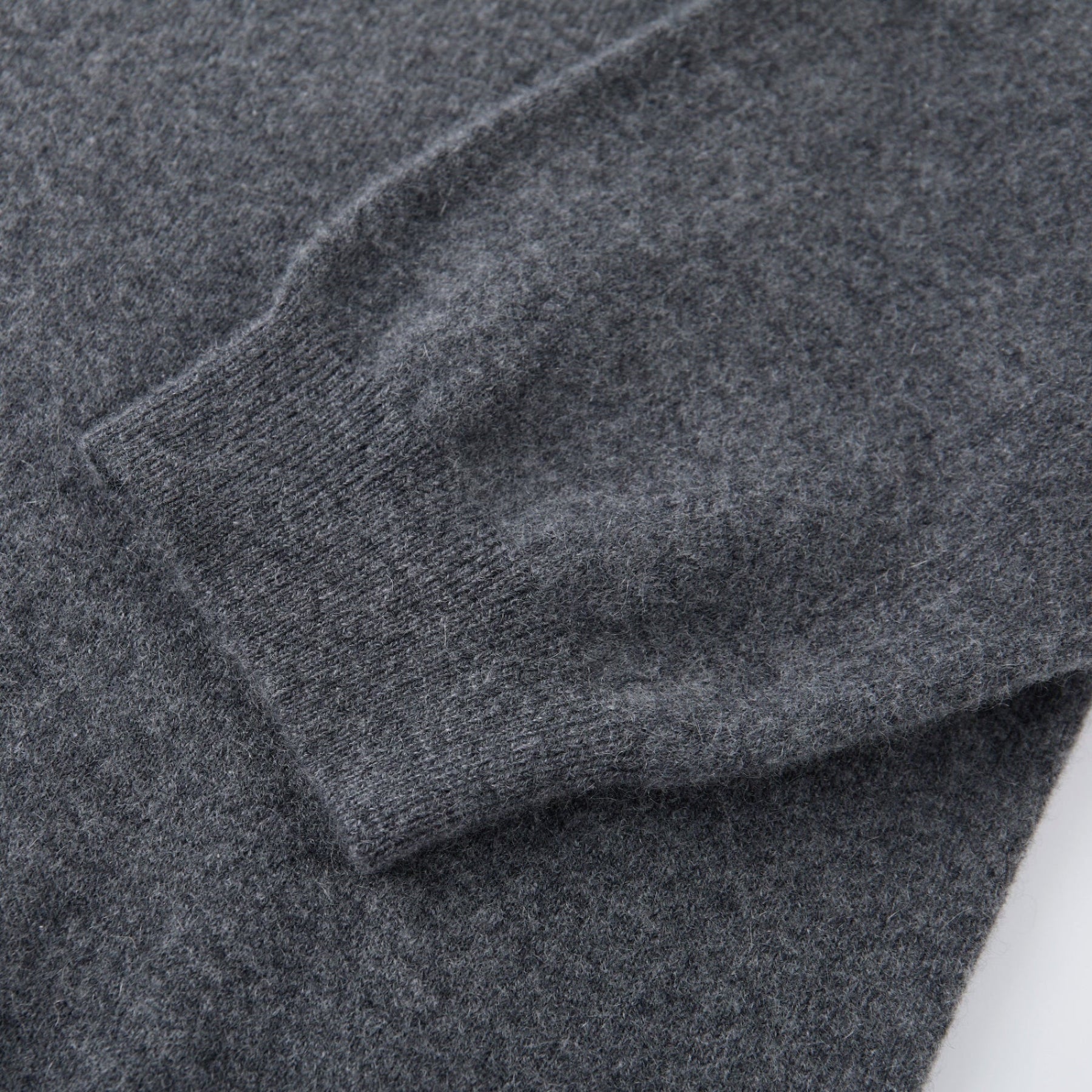 MA03 Cashmere Short Sleeve Crewneck Sweater by Mawei, grey, cuff rib detail close-up.