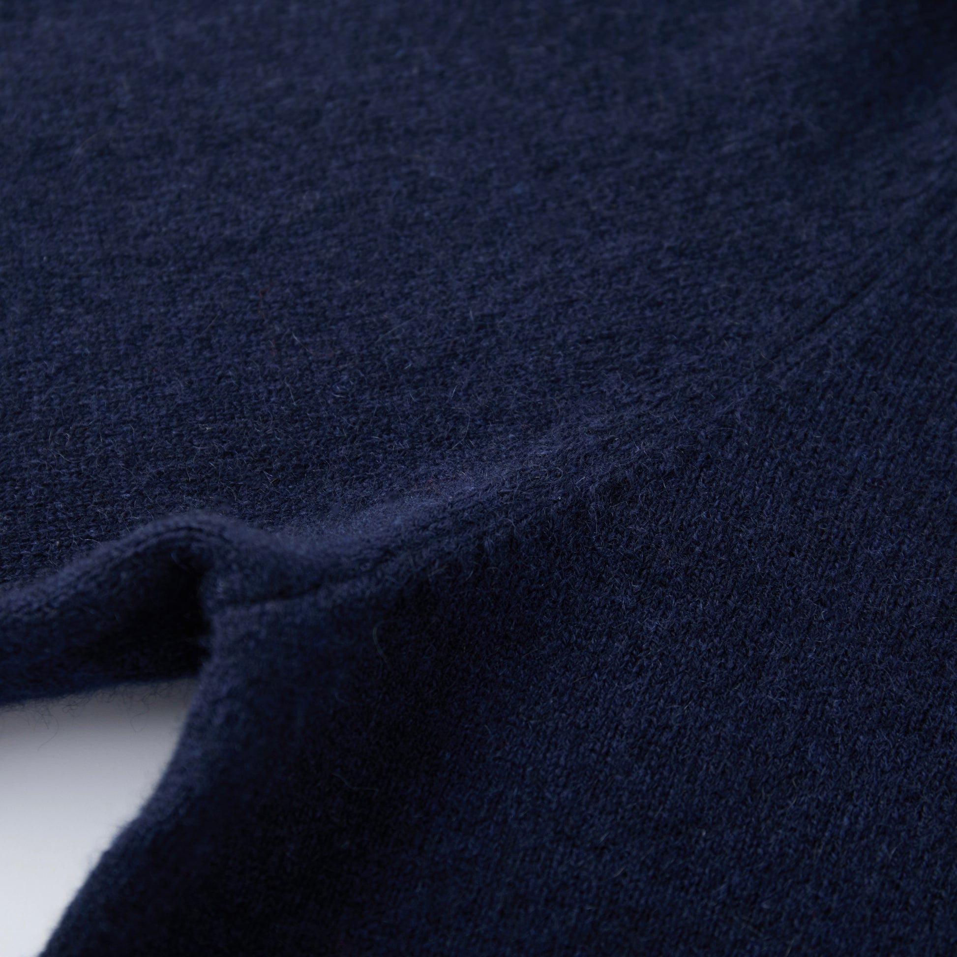 MA03 Cashmere Short Sleeve Crewneck Sweater by Mawei, navy blue, knitting detail close-up.