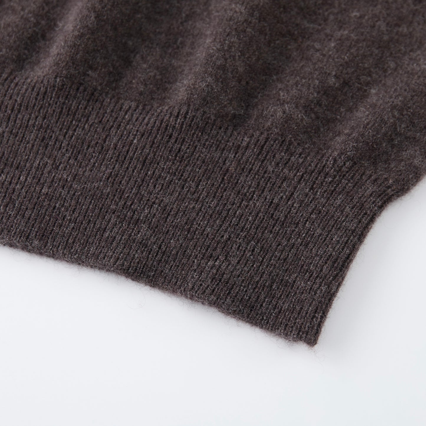 MA03 Cashmere Short Sleeve Crewneck Sweater by Mawei, brown, hem rib  detail close-up.