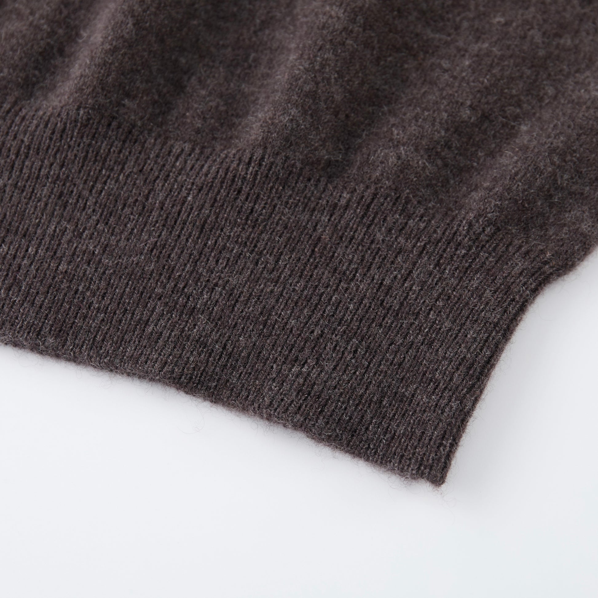 MA03 Cashmere Short Sleeve Crewneck Sweater by Mawei, brown, hem rib  detail close-up.