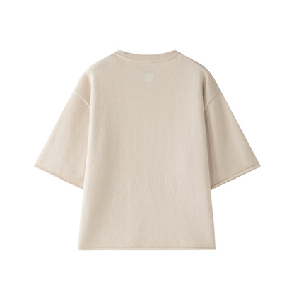 MA04 Cashmere Short Sleeve Tee with Pocket by Mawei, off white, flat lay back side. 