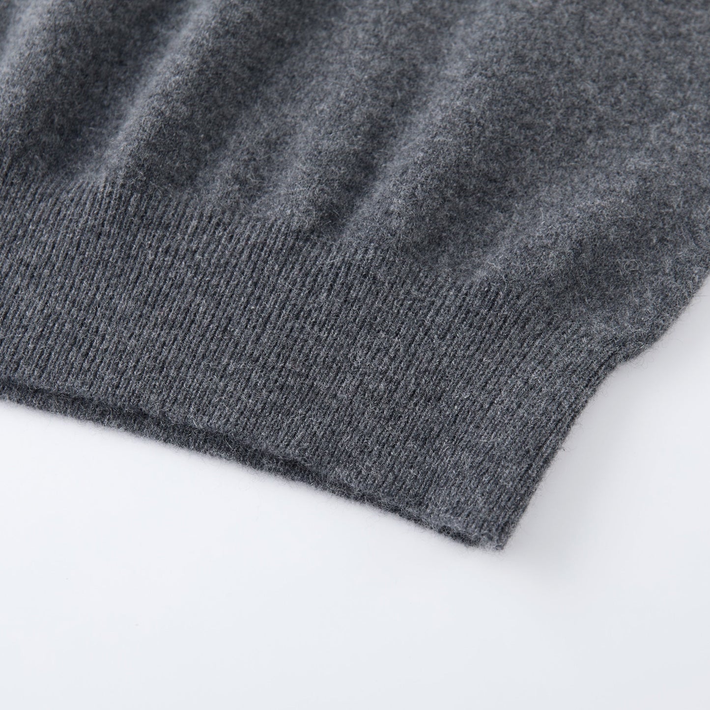 MA03 Cashmere Short Sleeve Crewneck Sweater by Mawei, grey, hem rib detail close-up.