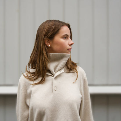 MA61 Cashmere Buff with Buttons by Mawei,  MA25 Cashmere Polo Sweater, off white, front view, female model.
