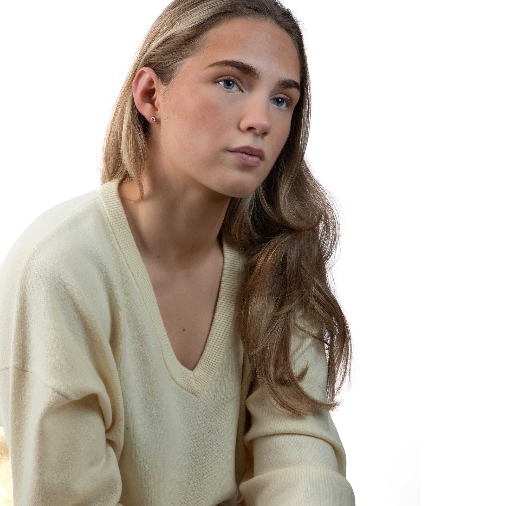 MA08 Oversized Cashmere  V-neck  Sweater by Mawei, yellow, female model, front view.