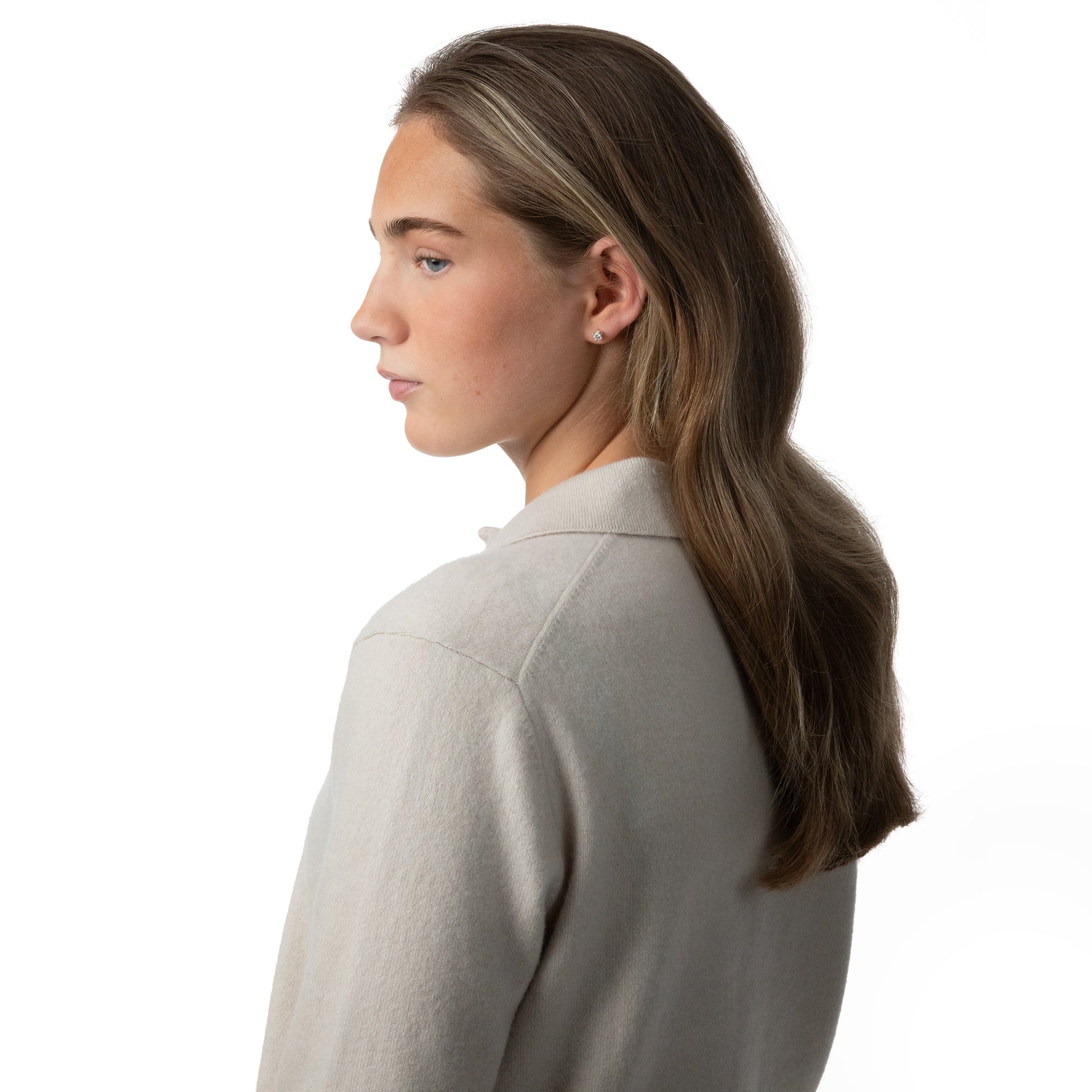 MA09 Cashmere Short Sleeve Polo Sweater by Mawei, off white, female model, side view.