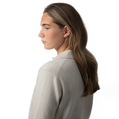 MA09 Cashmere Short Sleeve Polo Sweater by Mawei, off white, female model, side view.