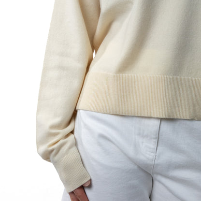 MA08 Oversized Cashmere  V-neck  Sweater by Mawei, yellow, cuff and hem rib details close up, front view.