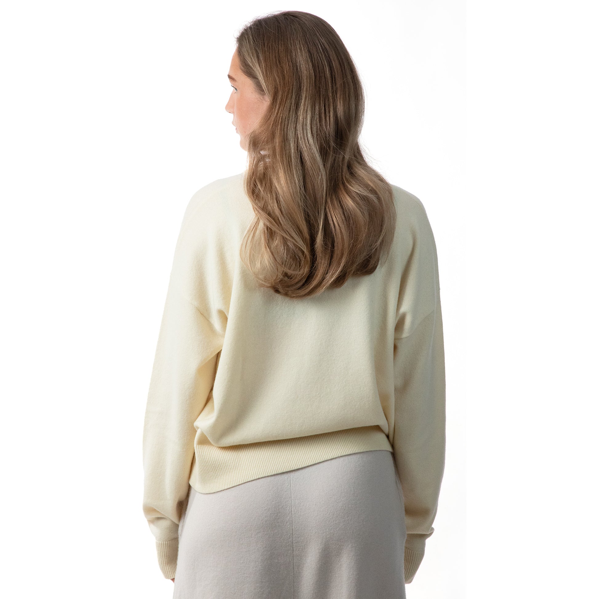 MA08 Oversized Cashmere  V-neck  Sweater by Mawei, yellow, female model, back view.