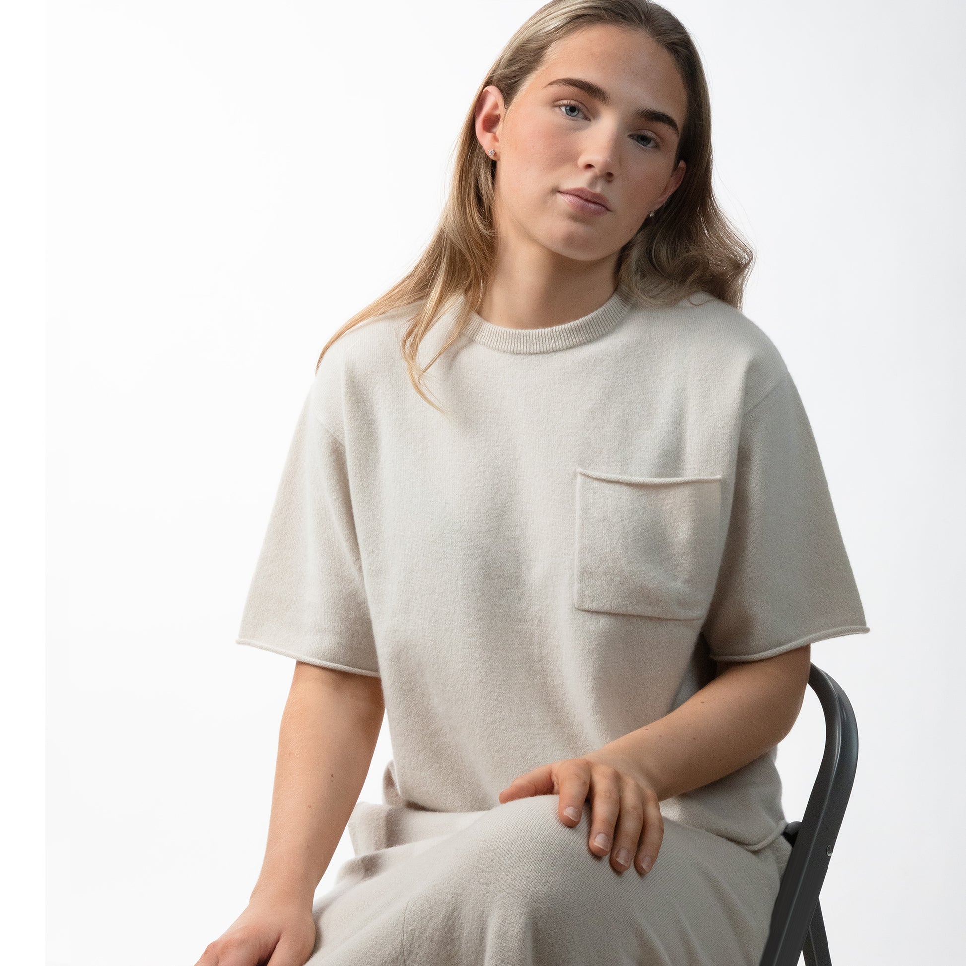 MA04 Short Sleeve Cashmere Tee with Pocket by Mawei, off white, female model, front view.