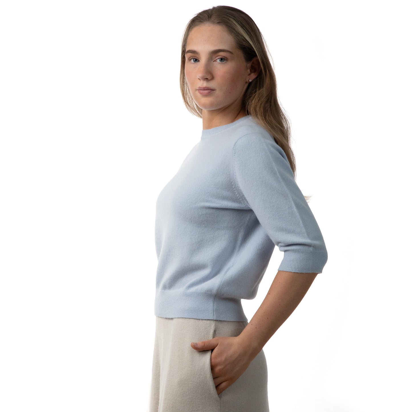 MA03 Cashmere Short Sleeve Crewneck Sweater by Mawei,  blue, side view, female model.
