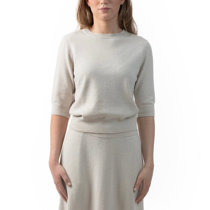 MA03 Cashmere Short Sleeve Crewneck Sweater by Mawei, off white, front view, female model.