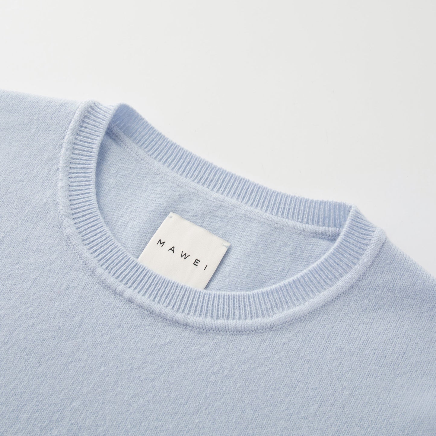 MA03 Cashmere Short Sleeve Crewneck Sweater by Mawei, blue, neck rib detail close-up.