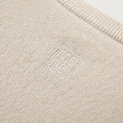 MA04 Short Sleeve Cashmere Tee with Pocket by Mawei, off white, fabric and logo embroidery close up,  back view
