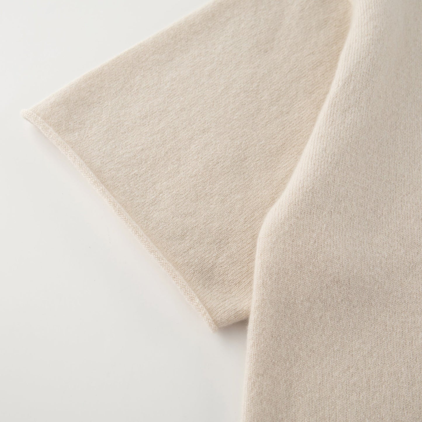 MA04 Short Sleeve Cashmere Tee with Pocket by Mawei, off white, sleeve close up.