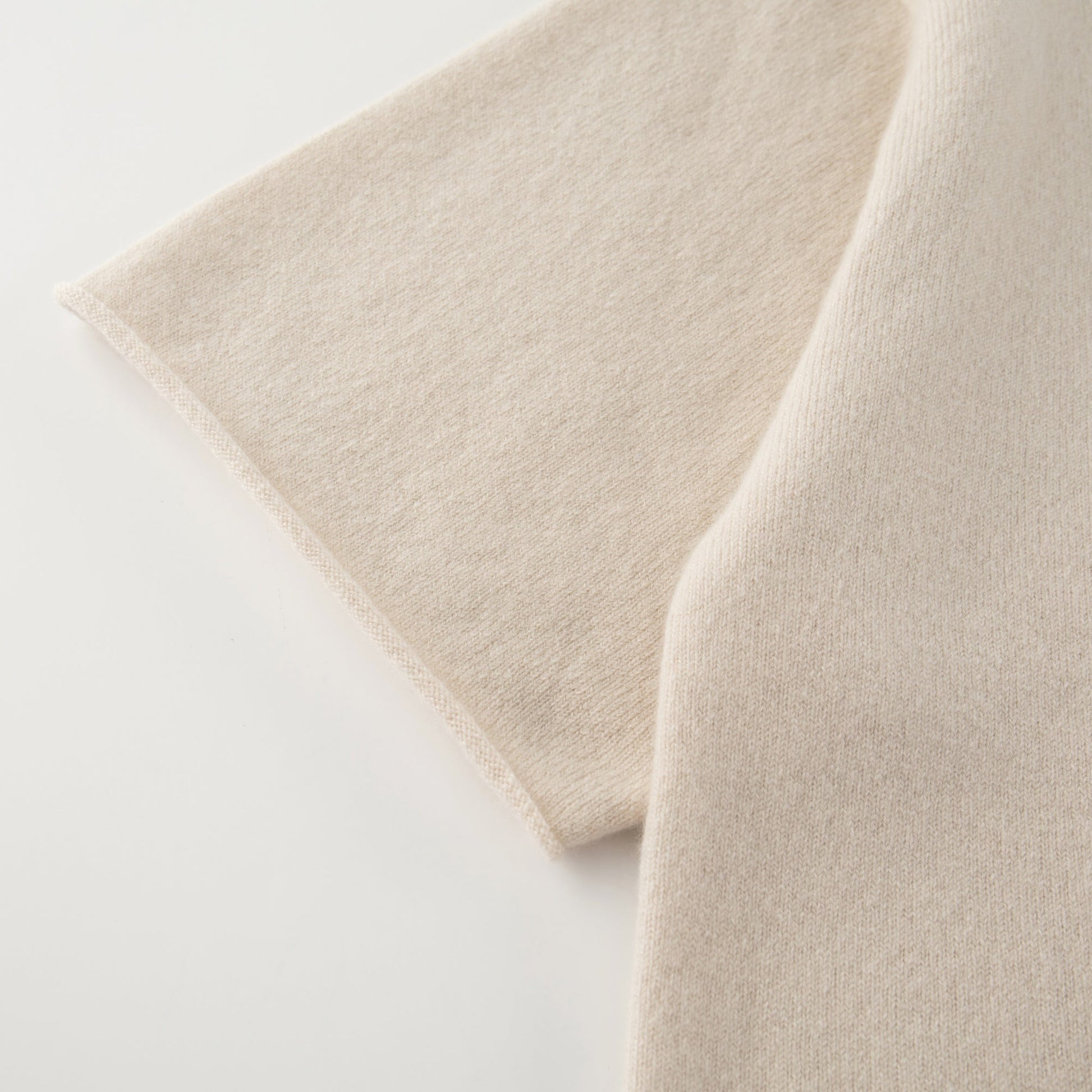 MA04 Short Sleeve Cashmere Tee with Pocket by Mawei, off white, sleeve close up.